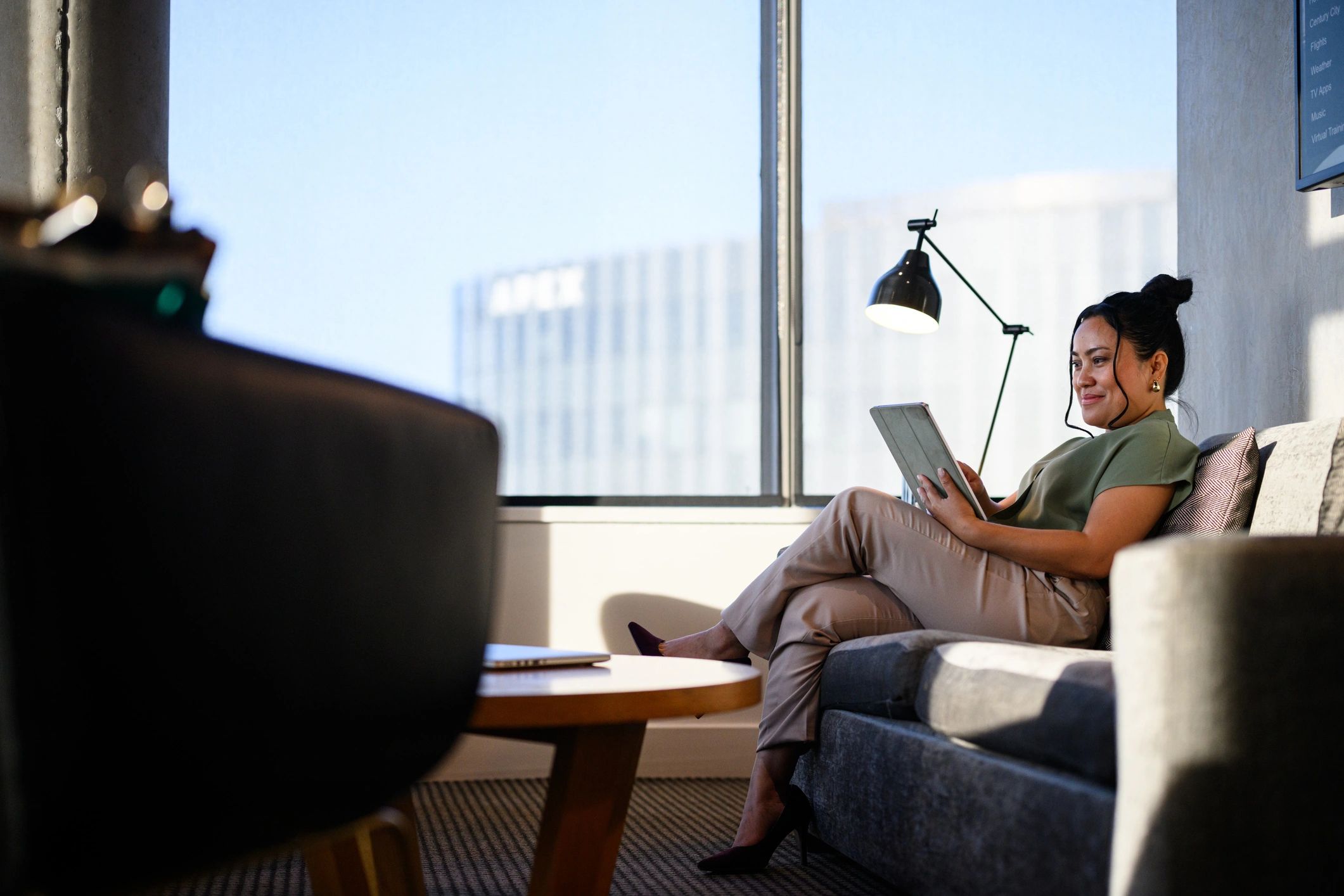 Professional woman working confidently in a bright office